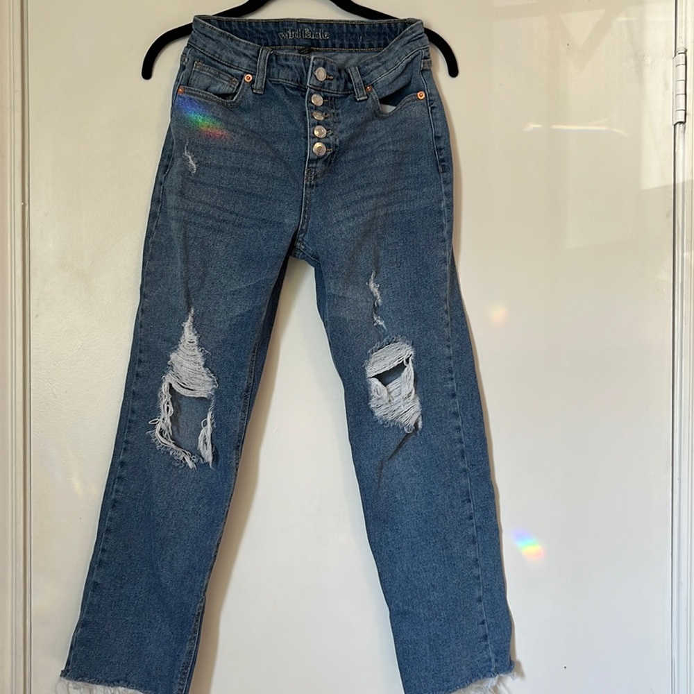 Distressed denim jeans